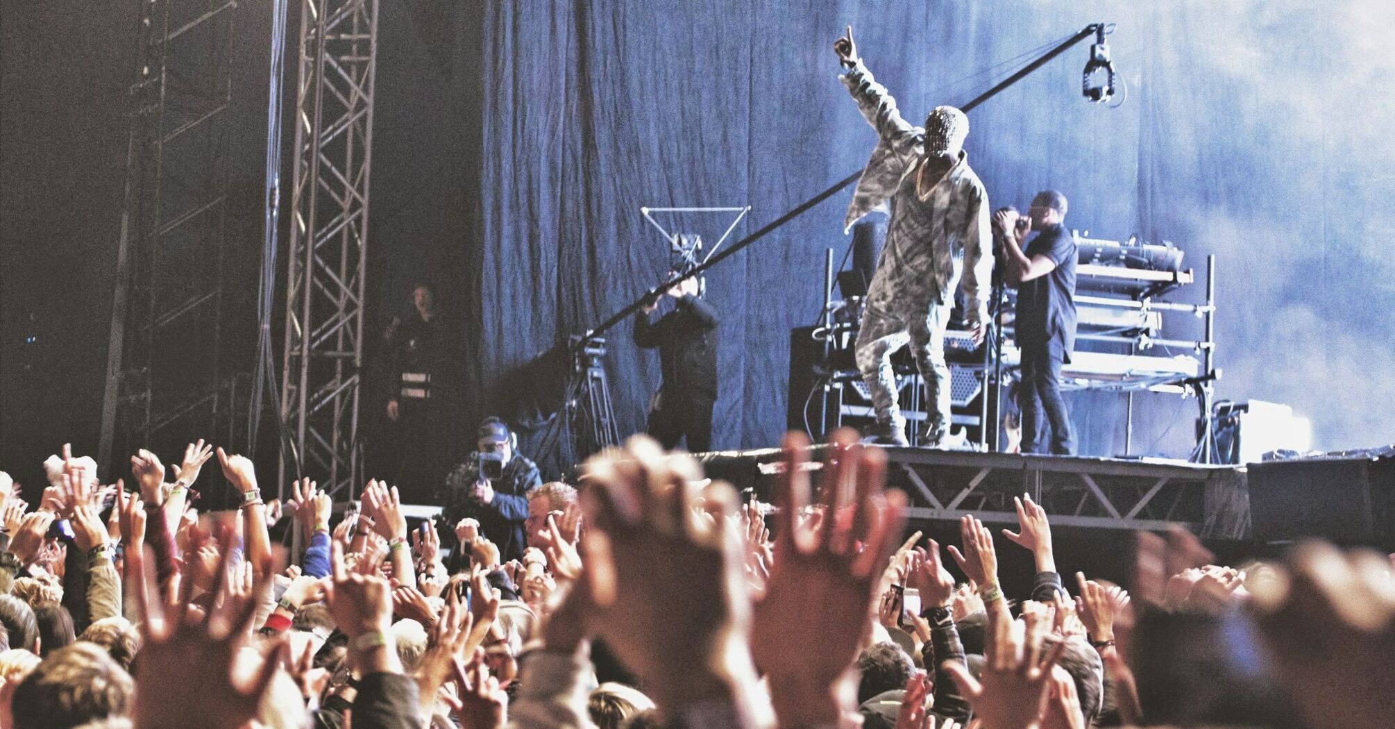 Kanye West performing on stage at music festival