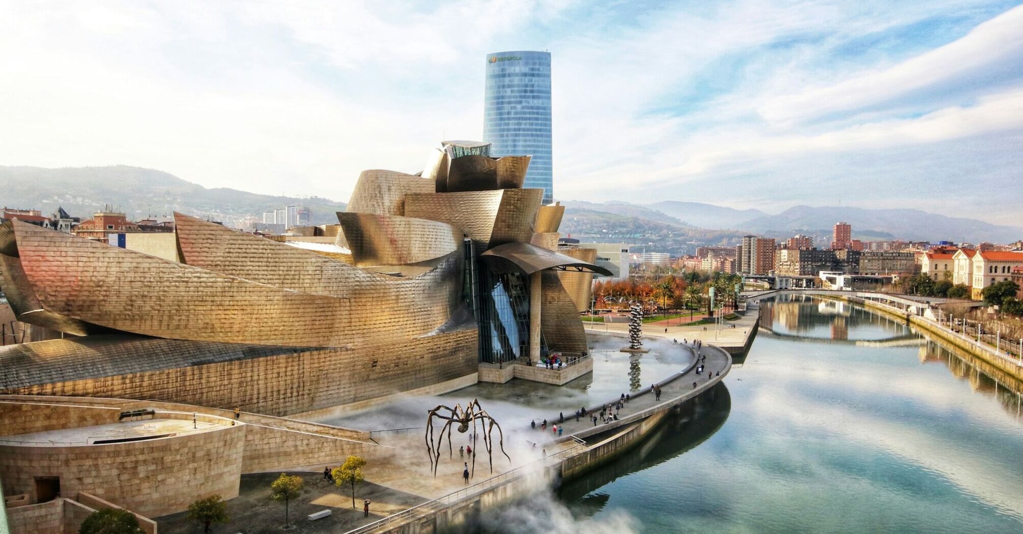 Guggenheim Museum Bilbao exterior beside river in Spain