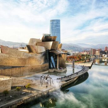 Guggenheim Museum Bilbao exterior beside river in Spain