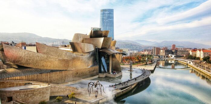 Guggenheim Museum Bilbao exterior beside river in Spain