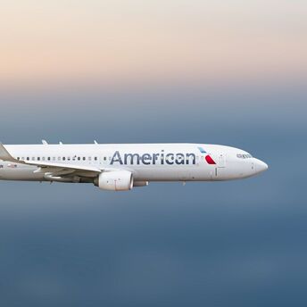 American Airlines aircraft flying in clear sky