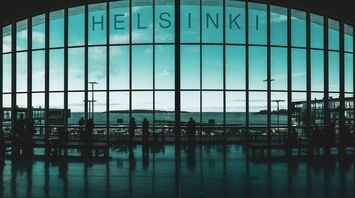 Helsinki Airport terminal interior with large panoramic window