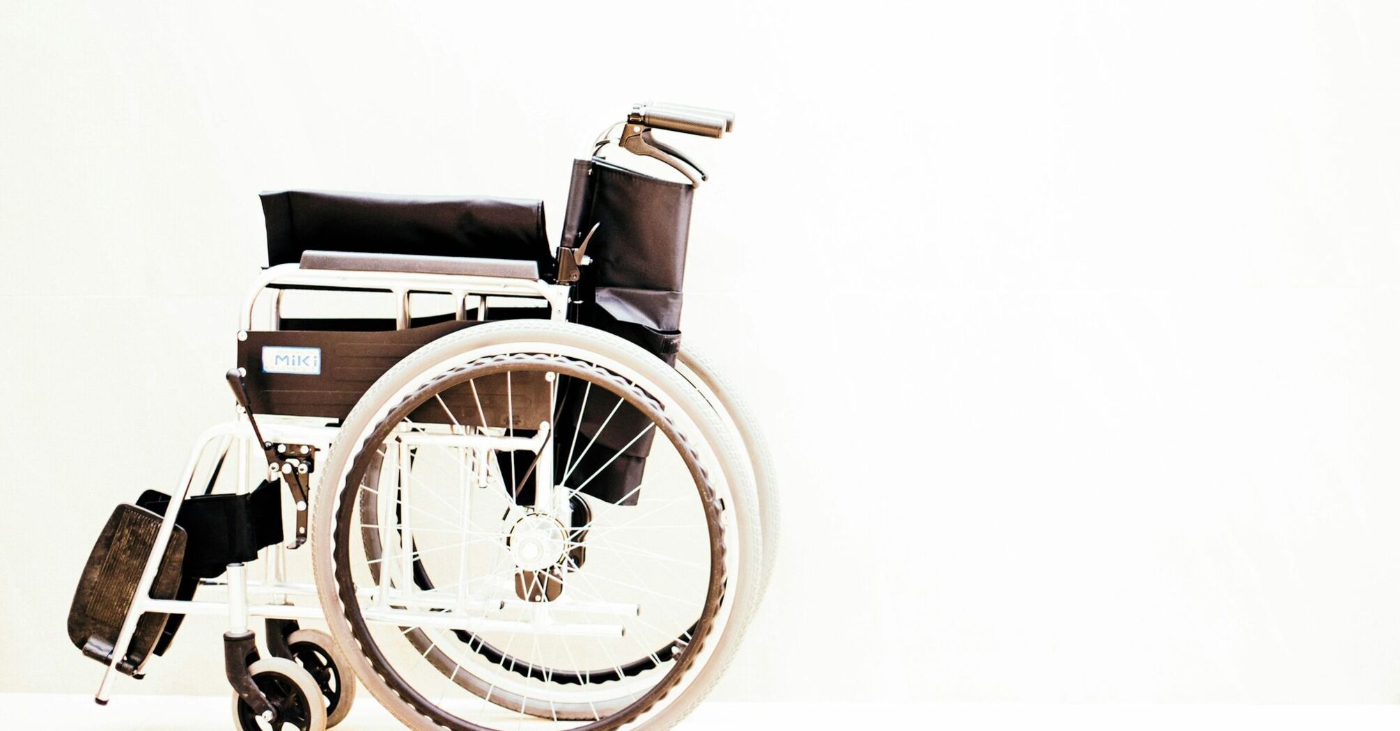 Manual wheelchair isolated on light background