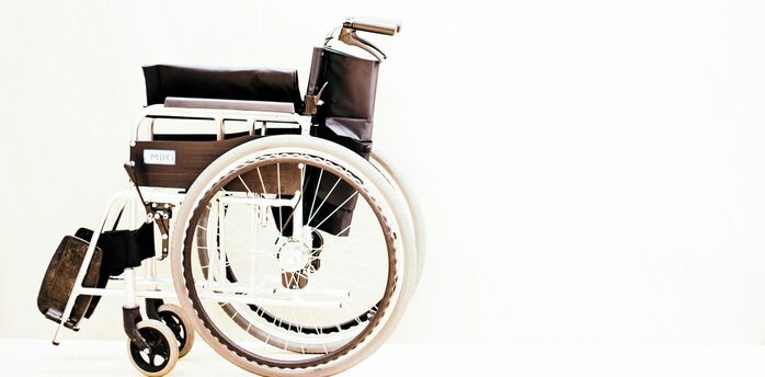 Manual wheelchair isolated on light background