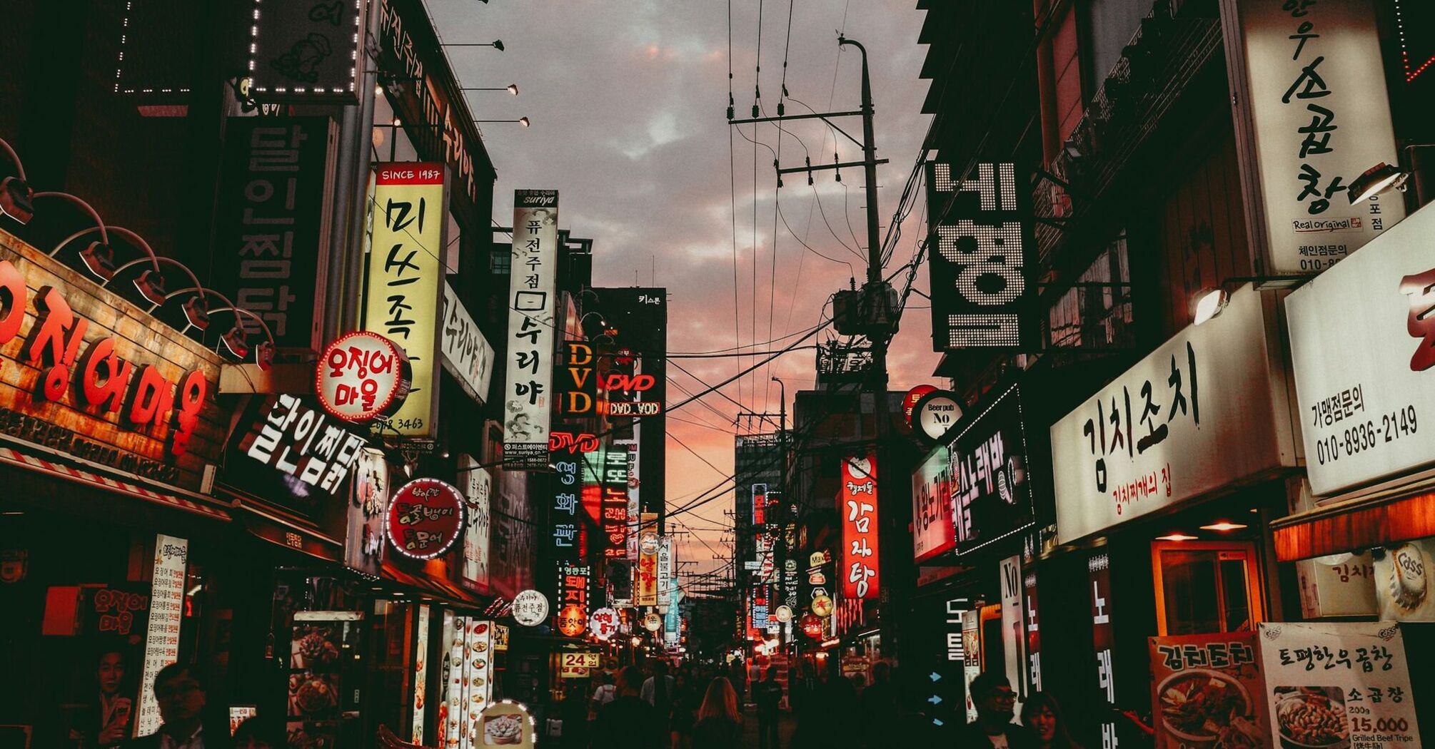 Seoul street with neon signs and restaurants