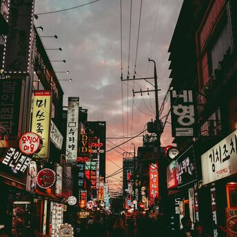 Seoul street with neon signs and restaurants
