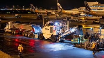 Runway resurfacing works taking place at airport apron at night