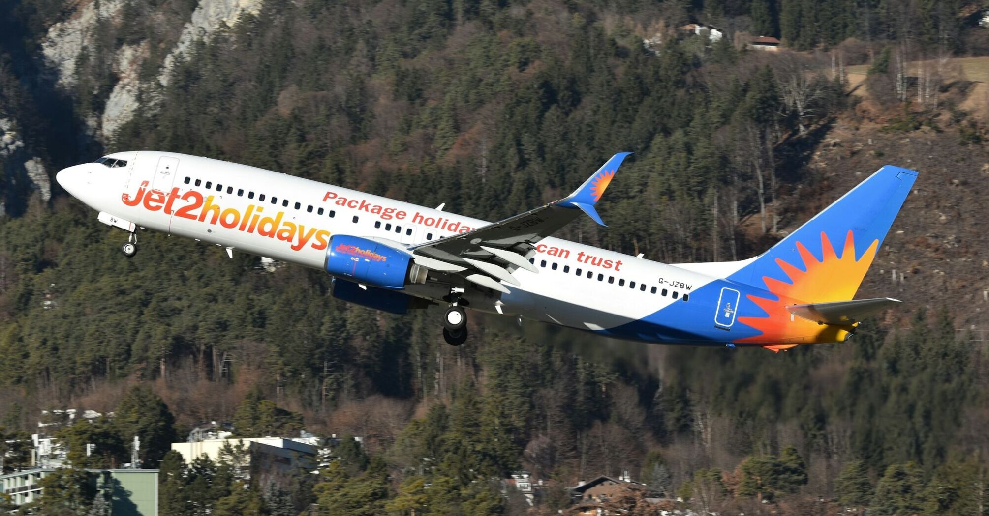 Jet2holidays aircraft in flight with package holiday branding