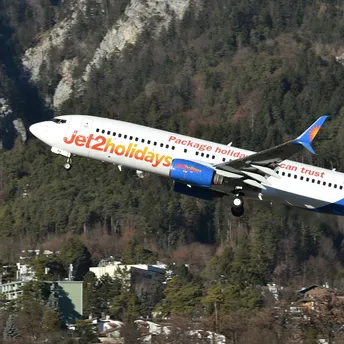 Jet2holidays aircraft in flight with package holiday branding