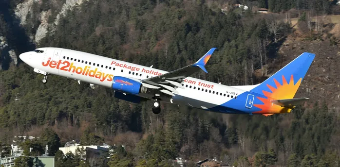 Jet2holidays aircraft in flight with package holiday branding