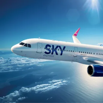 SKY express aircraft flying above clouds