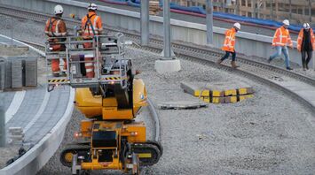 Rail workers carrying out maintenance on tracks