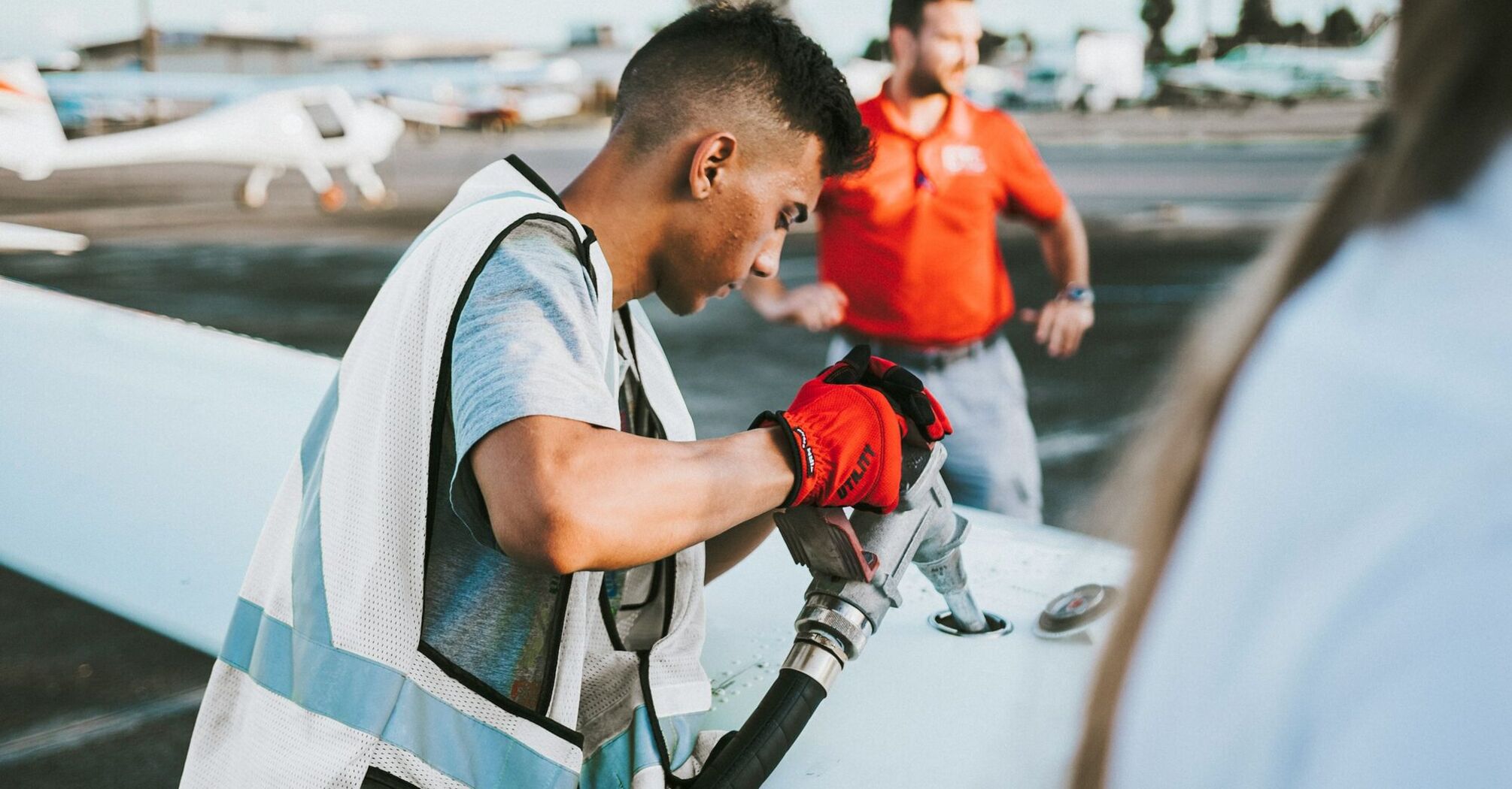 Aircraft refuelling on airport apron before departure