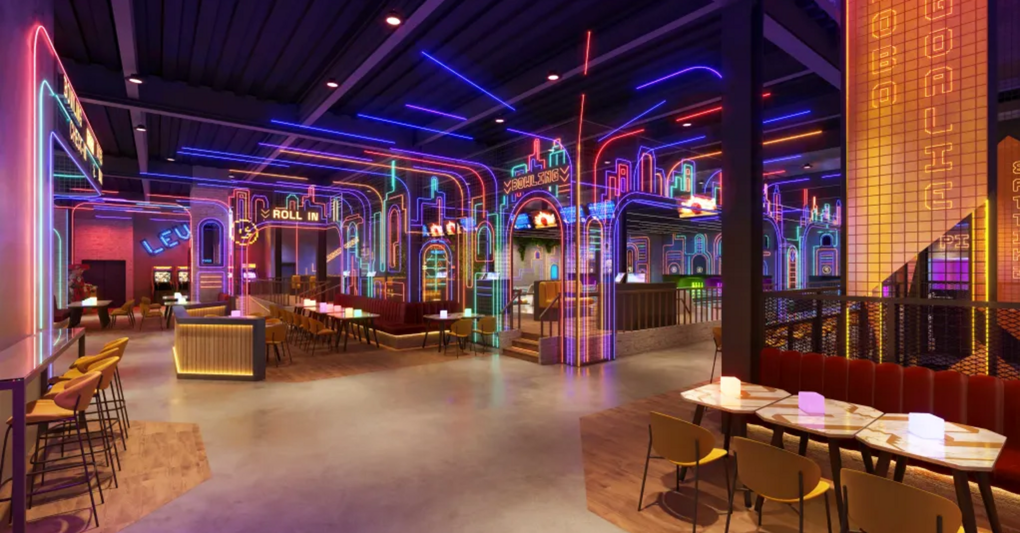 Neon-lit indoor entertainment venue with arcade and seating areas