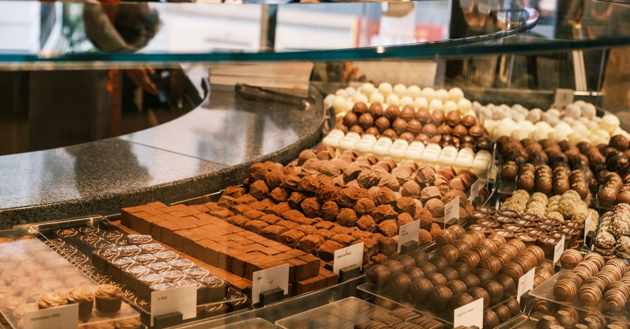Display of assorted chocolates in confectionery shop