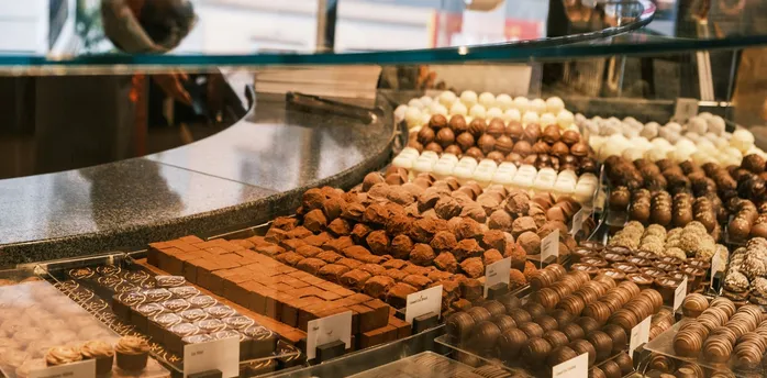 Display of assorted chocolates in confectionery shop