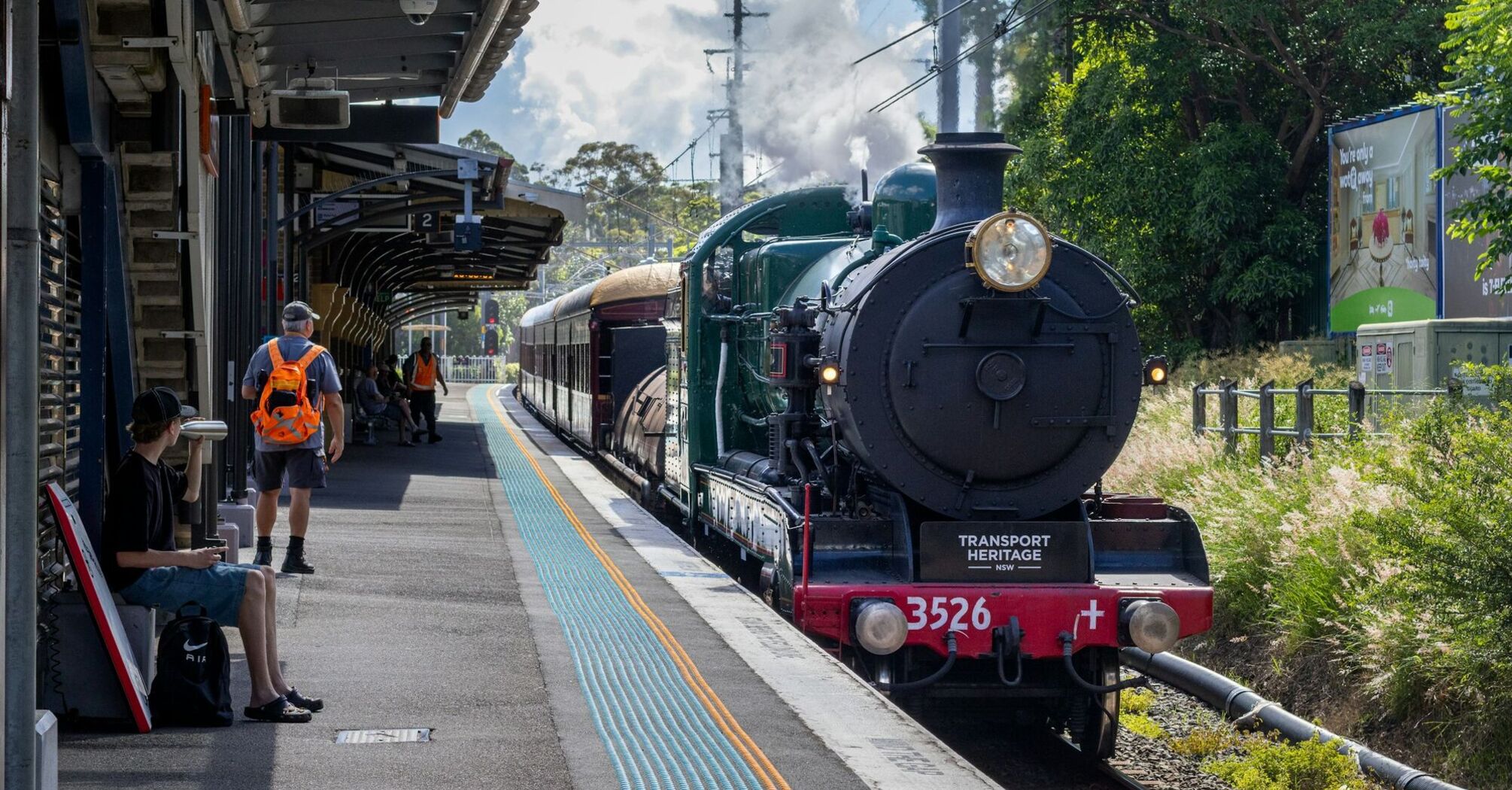 Vintage steam locomotive at small rural station platform