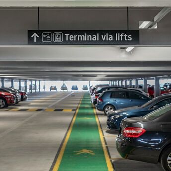 Airport car park with terminal access sign
