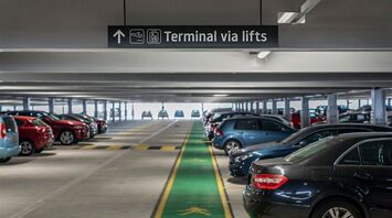 Airport car park with terminal access sign