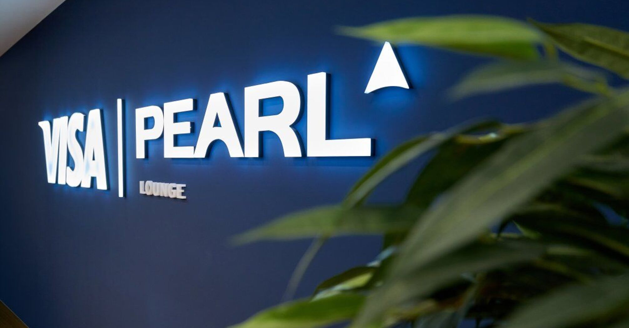 Visa Pearl Lounge sign interior detail