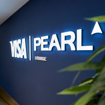 Visa Pearl Lounge sign interior detail