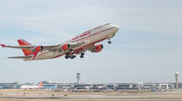 Air India aircraft taking off from airport runway