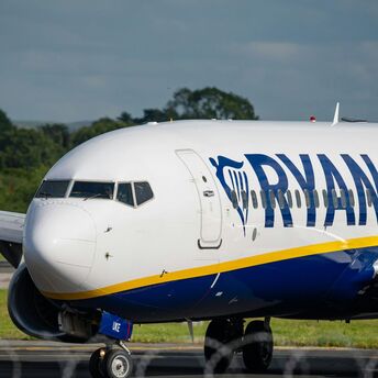 Ryanair aircraft on runway preparing for departure