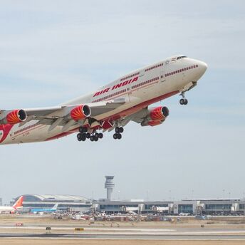 Air India aircraft taking off from Delhi airport runway