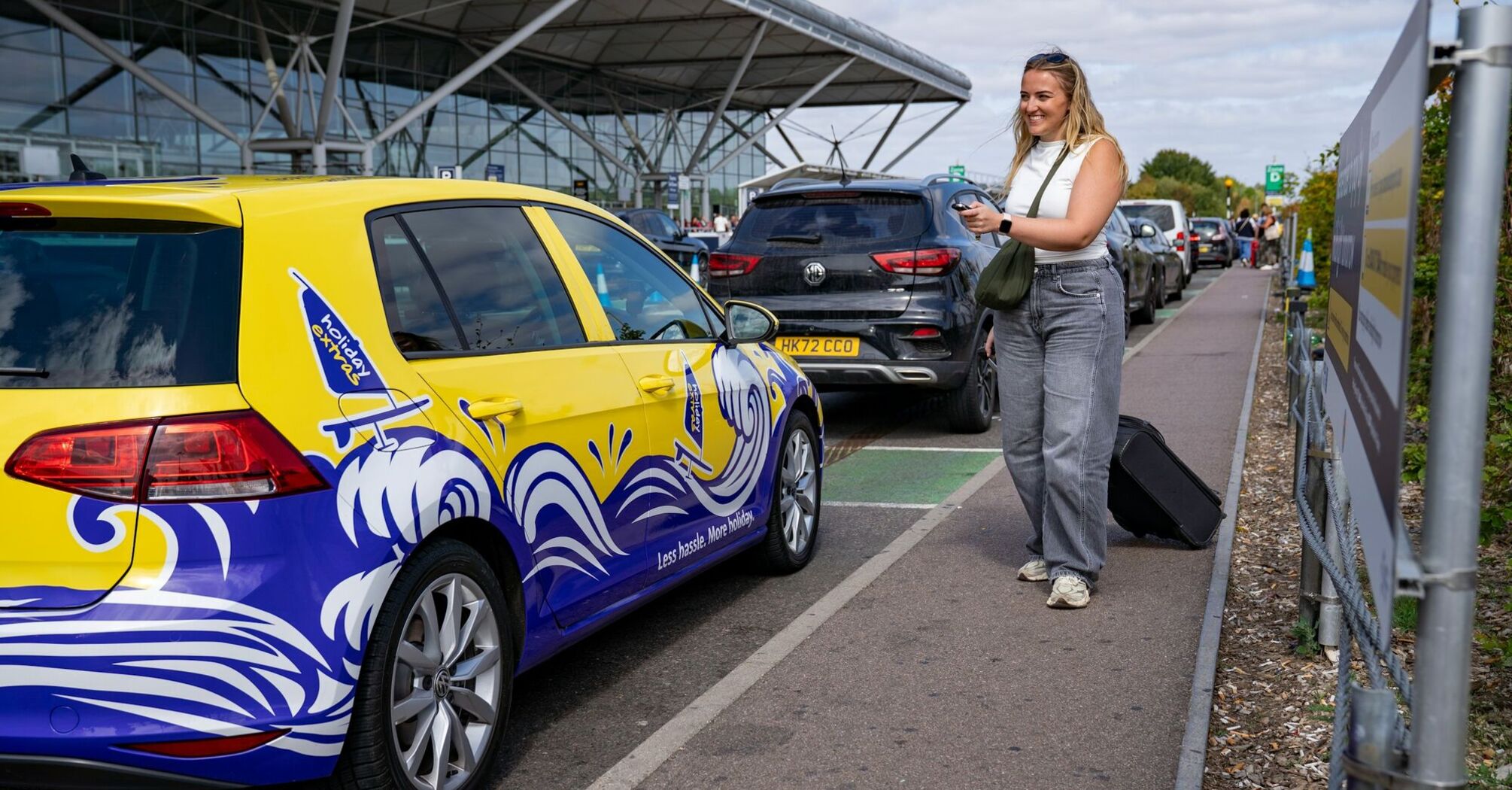 Passenger being dropped off outside Edinburgh Airport