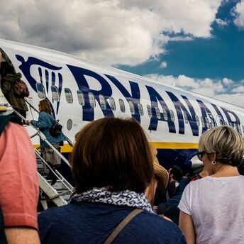 Passengers boarding a Ryanair aircraft