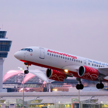 AnimaWings aircraft taking off at Vienna Airport