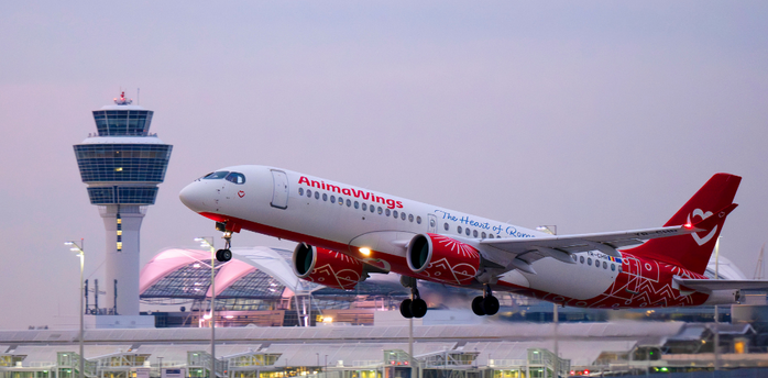 AnimaWings aircraft taking off at Vienna Airport