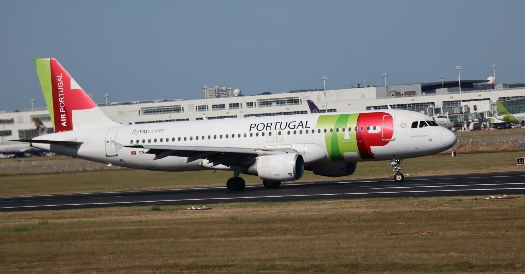 TAP Air Portugal aircraft on an airport runway