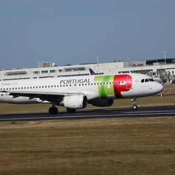 TAP Air Portugal aircraft on an airport runway