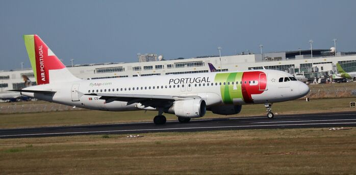 TAP Air Portugal aircraft on an airport runway