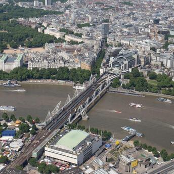 Aerial view of Charing Cross station and Hungerford Bridge in London