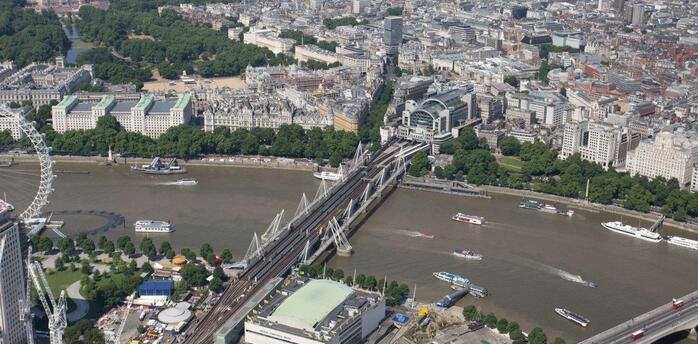 Aerial view of Charing Cross station and Hungerford Bridge in London