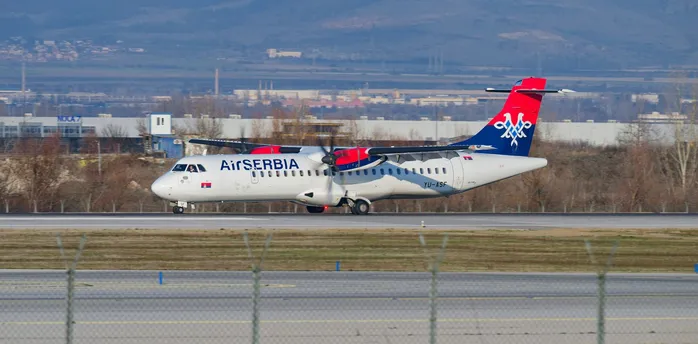 Air Serbia aircraft taxiing on runway at airport