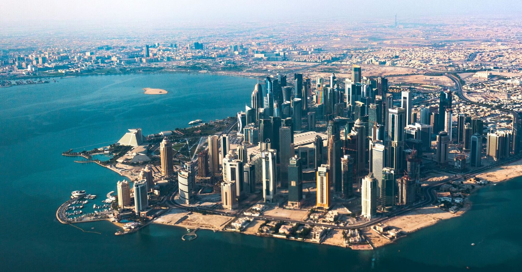 Aerial view of Doha’s waterfront skyline and bay