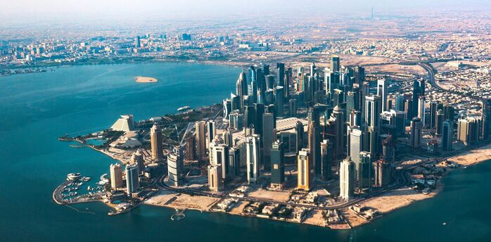 Aerial view of Doha’s waterfront skyline and bay