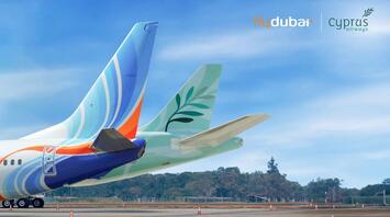 flydubai and Cyprus Airways aircraft tails on a runway
