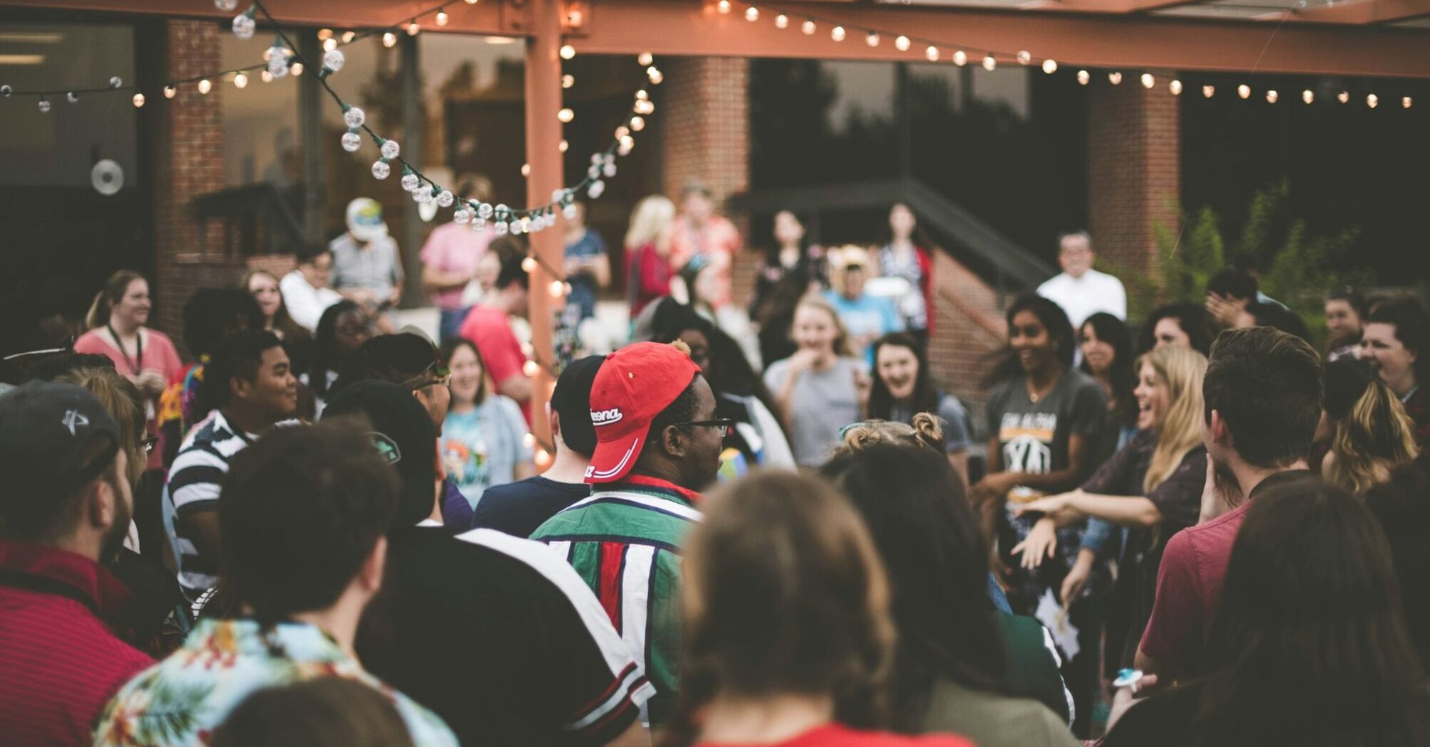 Crowd gathered at an outdoor summer event
