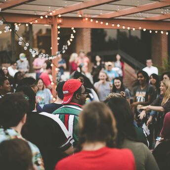Crowd gathered at an outdoor summer event