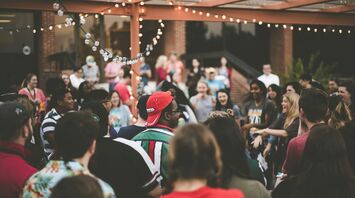Crowd gathered at an outdoor summer event