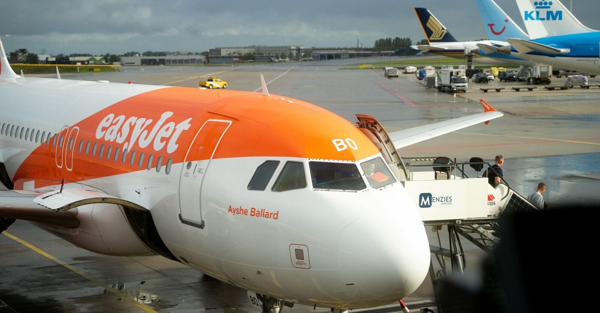 easyJet aircraft parked at an airport gate