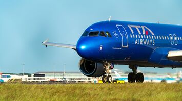 ITA Airways aircraft on runway at airport
