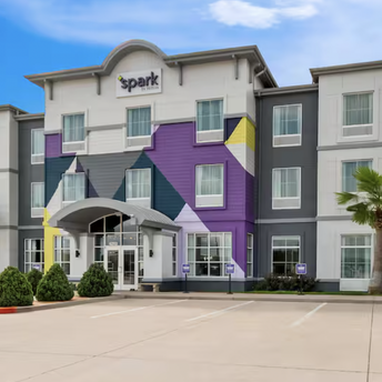 Exterior of a Spark by Hilton hotel building