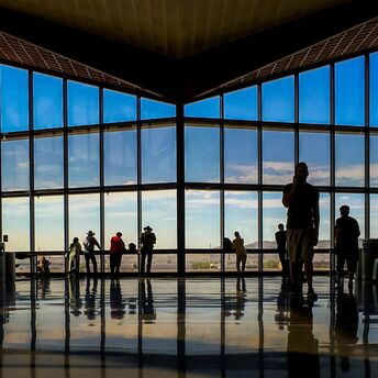 Passengers inside an airport terminal