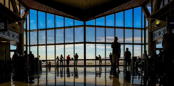 Passengers inside an airport terminal