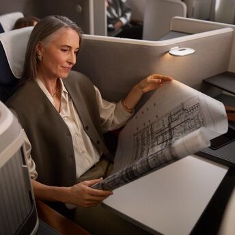 Passenger seated in Lufthansa Allegris business cabin